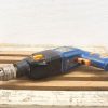 Used AEG power drill on rustic wood, perfect for creative DIY projects and repairs.