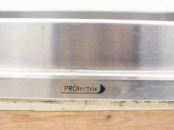 Polished Prolectrix aluminum strip on a natural wood workbench, showcasing durability and modern design.