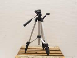 Lightweight aluminum tripod with quick-release plate, ideal for photographers seeking stability and versatility.