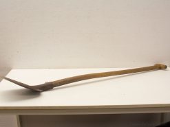 Vintage gardening hoe with sturdy wooden handle and metal blade, perfect for cultivating soil.