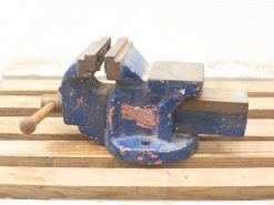 Sturdy vintage blue bench vice, ideal for woodworking and crafted with years of reliable use.