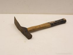 Vintage claw hammer with wooden handle, showcasing durability and a rich patina.