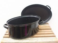 Elegant black oval enameled cast iron pot for delicious casseroles and shared meals.