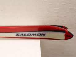 High-quality red and white Salomon cross-country ski designed for speed and performance.