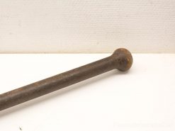 Vintage iron tool with rustic charm, showcasing history and craftsmanship in its design.