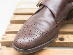 Stylish brown leather brogue shoes for men, blending classic elegance and modern design.