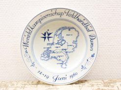 Ceramic plate commemorating the 1960 Womens Field Handball World Championship in the Netherlands.