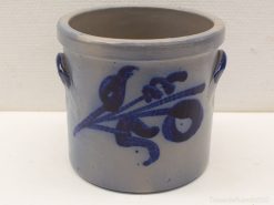 Charming gray ceramic pot with blue floral design, perfect for decor or as a flower pot.