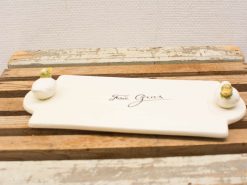 Elegant porcelain platter for serving foie gras with gold accents and rustic charm.