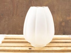 Elegant frosted glass lamp with flower design, perfect for modern or vintage interiors.