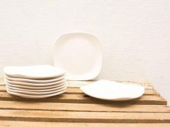 Elegant vintage white plates adding style and sophistication to your dining experience.