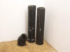 Set of used black metal pipes for industrial decor or functional plumbing applications.