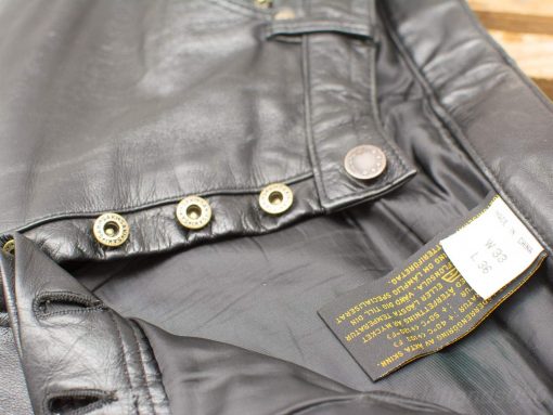 Stylish black leather jacket showcasing intricate details, craftsmanship, and timeless appeal.