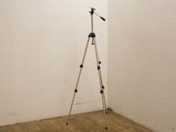 Lightweight aluminum tripod with pan/tilt head, ideal for photographers and videographers.