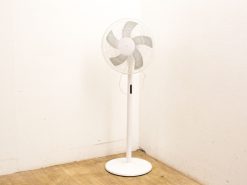 Modern minimal standing fan with translucent blades, perfect for contemporary interiors.