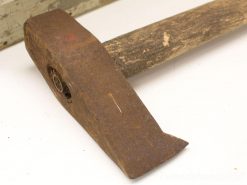 Vintage wooden hammer with rustic metal head, perfect for crafts and collection display.