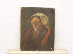 Portrait of an elderly woman in earthy tones, showcasing wisdom and character through her attire.