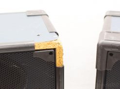 Comparison of two speaker cabinets: one damaged, one well-maintained, highlighting care importance.