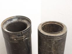 Vintage industrial metal cylinders for decorative storage with unique designs and history.