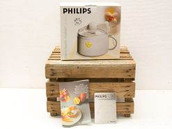 Vintage Philips HR2307 ice cream maker in original packaging with recipe pamphlets.