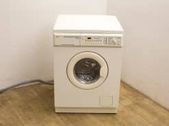 Modern AEG Oko Lavamat Turbo 13116 washing machine with energy-efficient front-loading design.