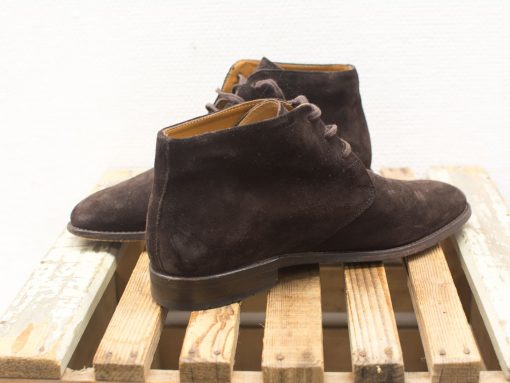 Stylish brown suede boots perfect for elevating any outfit, blending comfort and elegance.