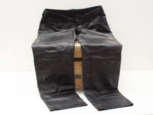 Elegant black leather pants for women, perfect for a chic vintage look.