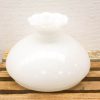 Elegant white ceramic vase with scalloped edge, perfect for flowers or decorative display.