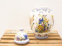 Vibrant floral ceramic vase and container set, perfect for enhancing any interior decor.