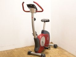 Sleek gray and red stationary exercise bike with adjustable features for comfortable workouts.