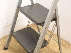 Durable metal step ladder for home and garden projects, featuring non-slip steps and reliable support.