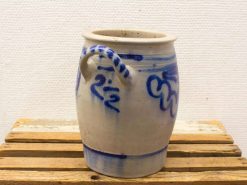 Charming ceramic jug with blue patterns, ideal for decoration and everyday use.