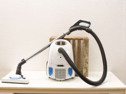 Sleek white vacuum cleaner with blue accents, designed for efficient and stylish home cleaning.