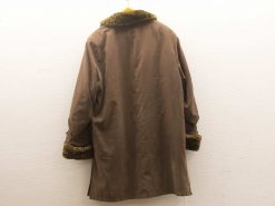 Elegant brown winter coat with fur collar for women, perfect for cold weather style.