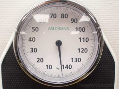 Medisana mechanical scale with clear glass face and easy-to-read weight markings up to 140 kg.