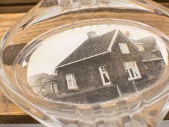 Vintage glass ashtray featuring a nostalgic photo of a traditional house with white windows.