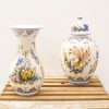 Colorful vintage floral vase and urn with decorative motifs, perfect for stylish decor.