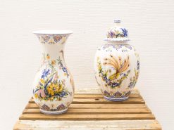 Colorful vintage floral vase and urn with decorative motifs, perfect for stylish decor.