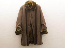 Elegant vintage winter coat with luxurious fur collar, perfect for stylish warmth.