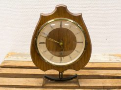 Elegant vintage wooden table clock with Roman numerals, perfect for adding charm to any space.