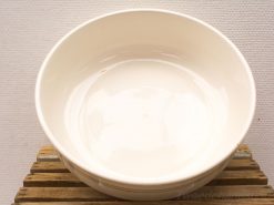 Stylish vintage Villeroy & Boch white bowl on rustic wood, ideal for everyday use.