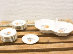 Elegant porcelain dishware set with floral patterns, perfect for special occasions and gatherings.