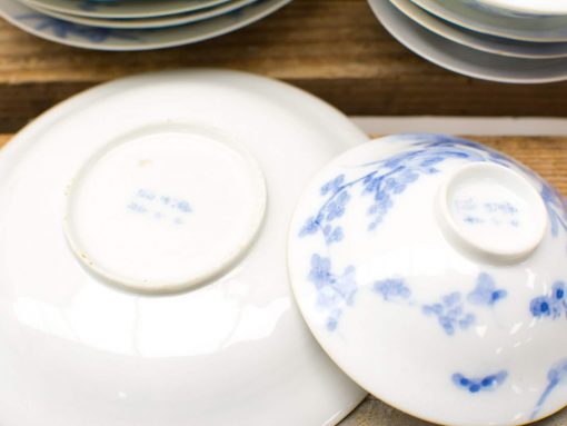 Elegant porcelain bowls featuring a blue floral design, perfect for any dining occasion.