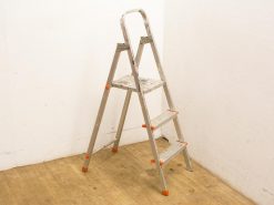 Durable aluminum step ladder with anti-slip steps, perfect for everyday household tasks.