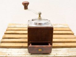 Antique wooden coffee grinder with metal mechanism and adjustable grind, perfect for coffee enthusiasts.