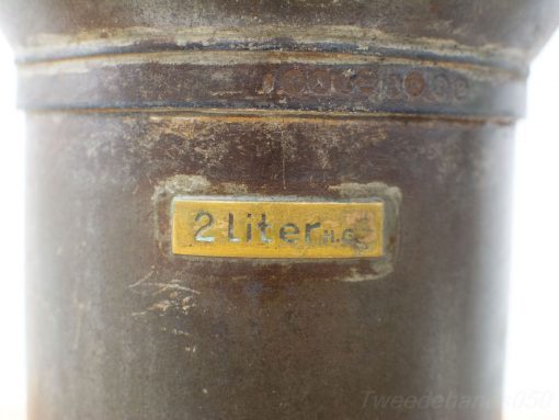 Vintage 2 liter metallic measuring cup with charming patina and embossed label. Perfect for collectors.