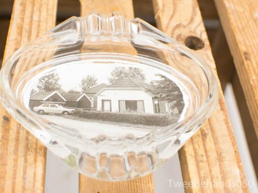 Vintage shell glass dish featuring black-and-white suburban scene photograph from the mid-20th century.