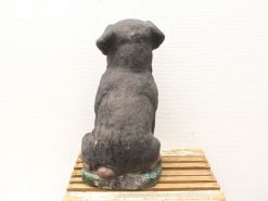 Vintage Rottweiler statue, stylish and weathered, perfect for dog lovers and home decor.