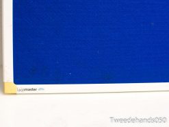 Vibrant blue Legamaster bulletin board for professional presentations and collaborative work.