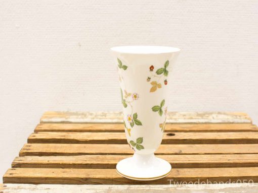 Elegant ceramic vase with floral patterns, perfect for enhancing any decor style.